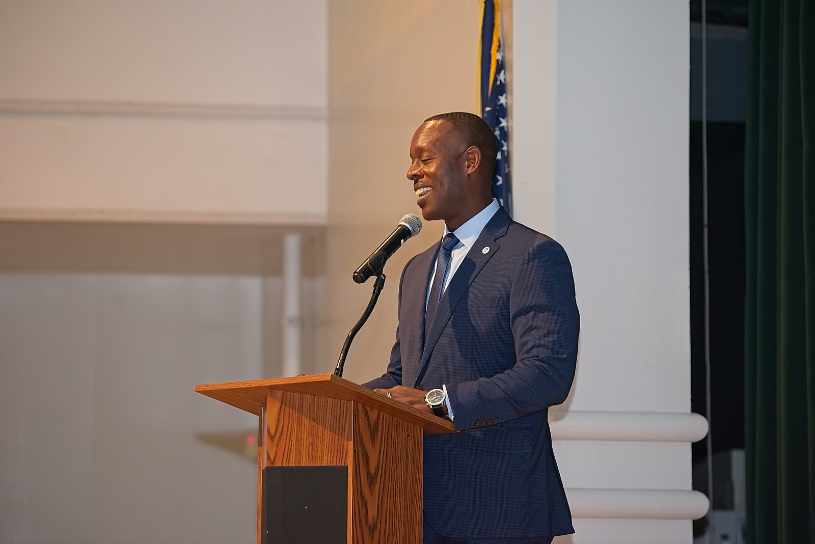 A presenter speaking at the podium during Academic Leadership Days