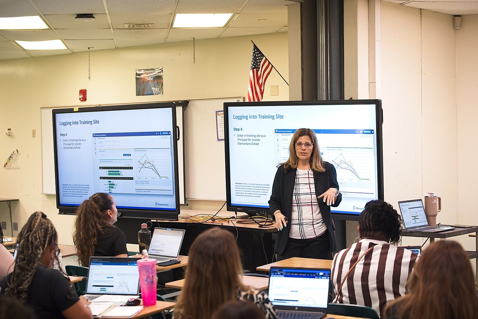 A presenter demonstrating a PowerSchool training site during a breakout session