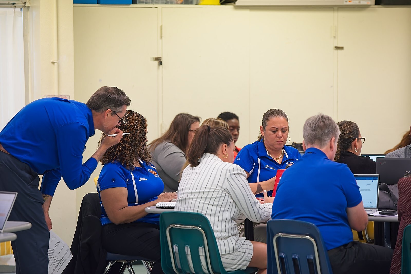 A small group working together during a breakout session