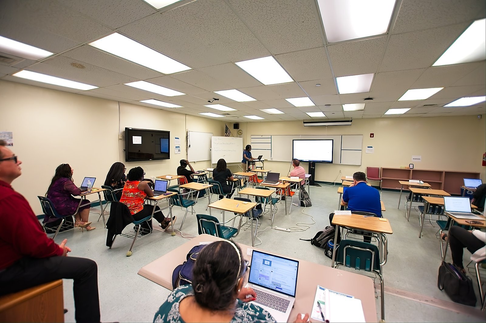 A breakout session classroom viewed from the back of the room