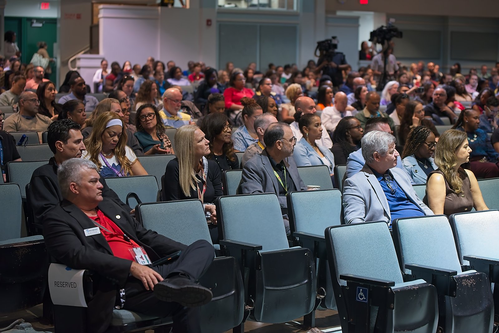 Parents and educators seated in the audience at the AI Symposium