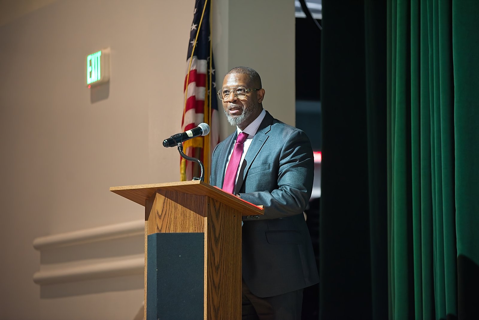 AI Symposium speaker at the podium at Nova High School